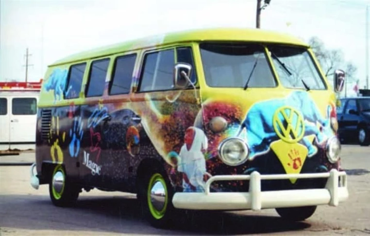 Full coverage vehicle wrap on Classic VW Bus with funky
