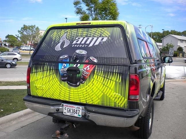 Complete Vehicle Wrap with Rear Window using special See-Thru Perforated Window Vinyl with Clear Overlaminate for complete unobstructed viewing from the inside of the cab.